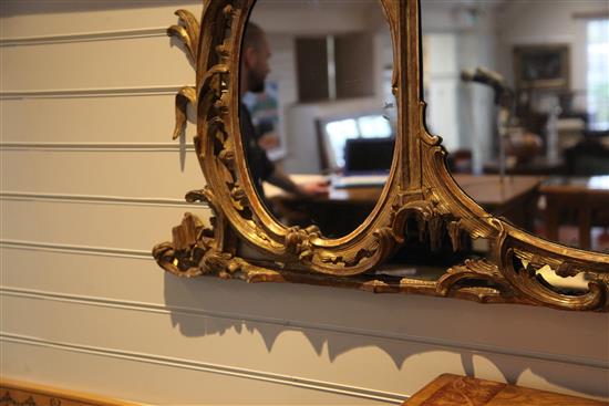 A fine George III Chippendale carved and giltwood wall mirror, H.3ft 11in. W.5ft 4in.